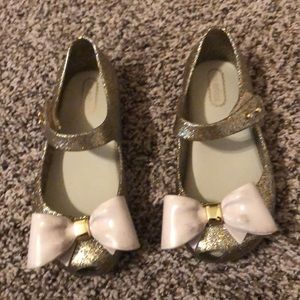 Gold mini Melissa shoes
